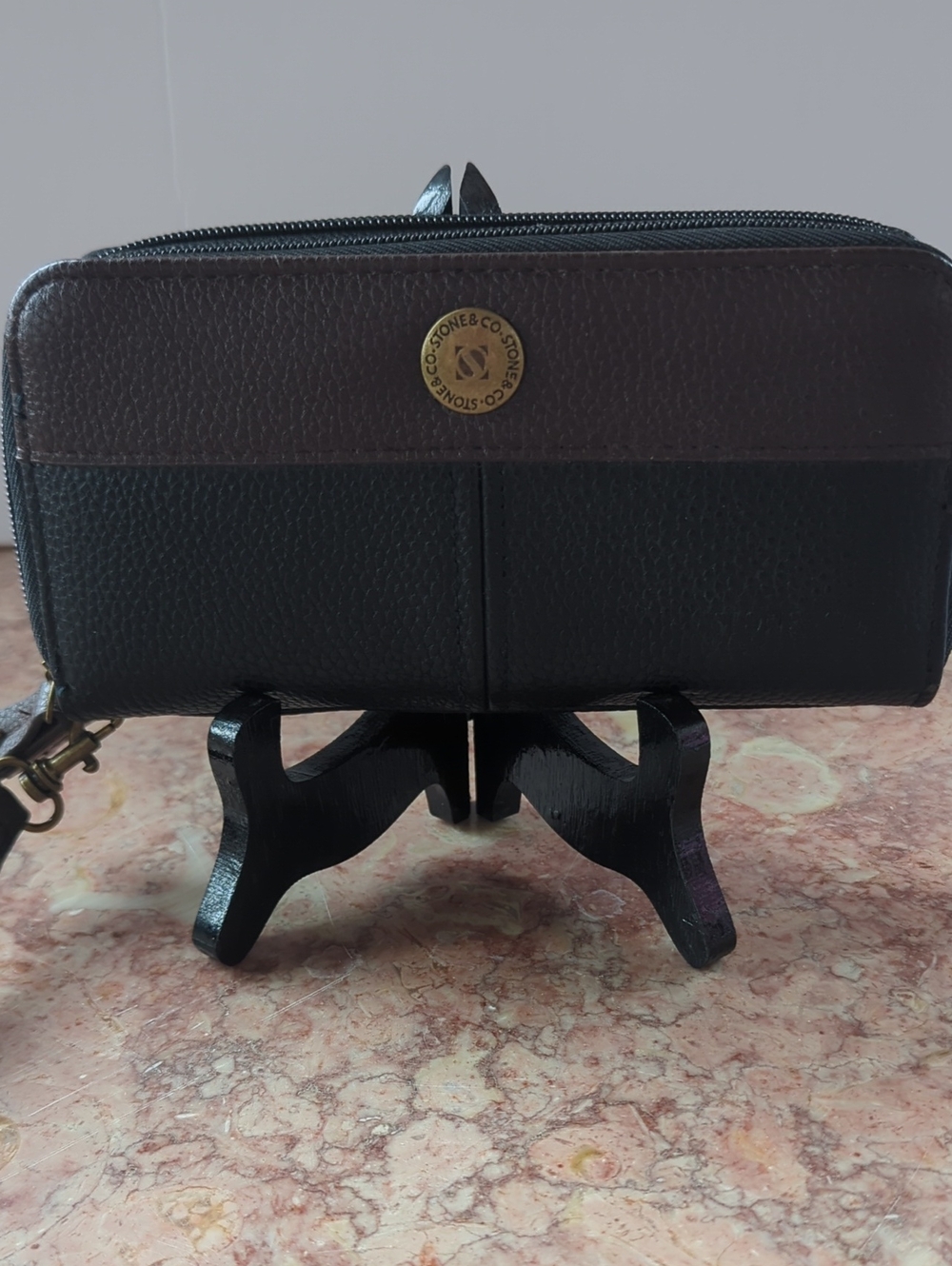 Stone & Co. Black and Brown Leather Wristlet Clutch with Gold Emblem
